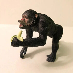 Chimpanzee Eating Banana Figure Animal Monkey 7.5  Inch Long Toy